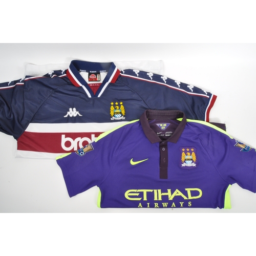 399 - A large collection of vintage 20th century and later Manchester City Football club shirts, T shirts ... 