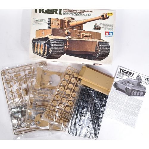 10 - Three vintage TAMIYA model kits of military interest, comprising of; no. 35202 Tiger I Kommandant Ot... 