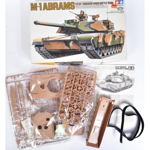 10 - Three vintage TAMIYA model kits of military interest, comprising of; no. 35202 Tiger I Kommandant Ot... 