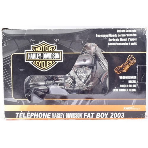 104 - An official Harley Davidson licensed ' Fat Boy ' novelty telephone. Two piece model operated by lift... 