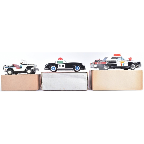 113 - Tinplate Toys - Three vintage Japanese and Chinese tinplate friction powered cars of police interest... 