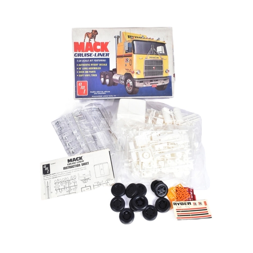 13 - Two vintage plastic model kits of transport interest, comprising of; AMT Mack Cruise-Liner tractor t... 