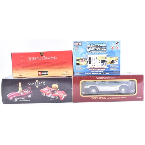 131 - Diecast - a collection of x4 assorted 1/18 scale diecast model cars comprising; Burago Lamborghini M... 