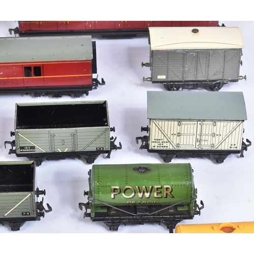 135 - A collection of assorted vintage OO gauge model railway trainset rolling stock from a variety of mak... 