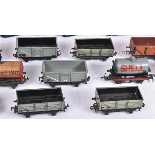 135 - A collection of assorted vintage OO gauge model railway trainset rolling stock from a variety of mak... 