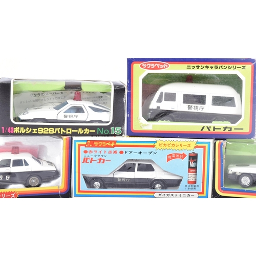 171 - Diecast - a collection of x5 vintage Japanese made diecast model Police Cars to include Porsche 928 ... 