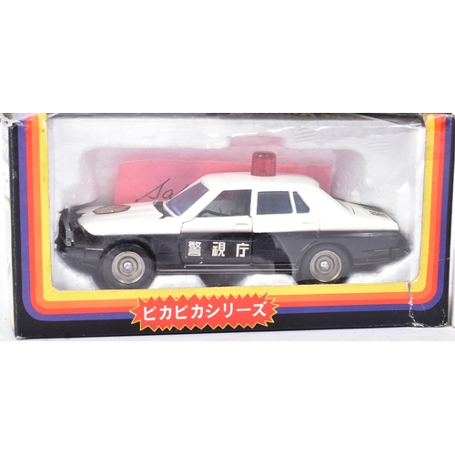 171 - Diecast - a collection of x5 vintage Japanese made diecast model Police Cars to include Porsche 928 ... 