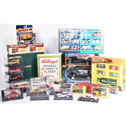 209 - Diecast - a collection of assorted boxed diecast model cars and other vehicles of various scales and... 