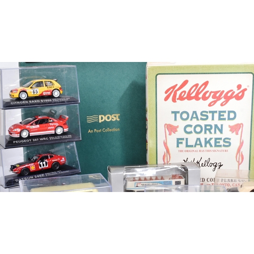 209 - Diecast - a collection of assorted boxed diecast model cars and other vehicles of various scales and... 