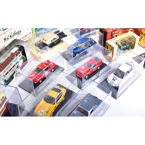 209 - Diecast - a collection of assorted boxed diecast model cars and other vehicles of various scales and... 