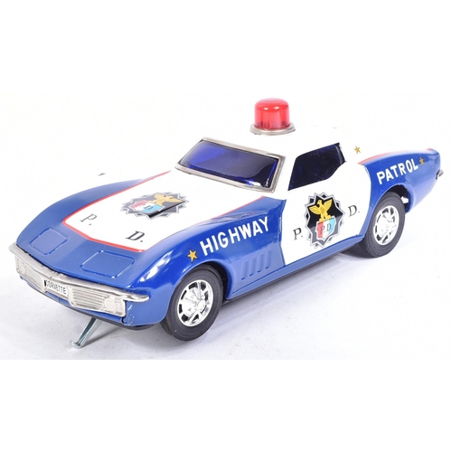 231 - Tinplate Toys - x2 vintage Japanese (Taiyo) tinplate battery operated police cars. One being a Highw... 