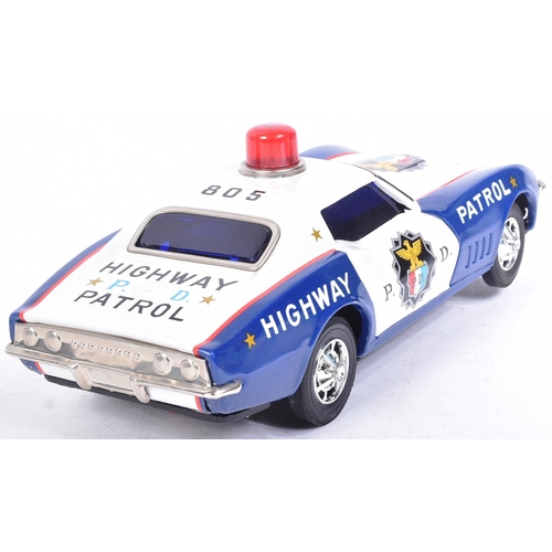 231 - Tinplate Toys - x2 vintage Japanese (Taiyo) tinplate battery operated police cars. One being a Highw... 