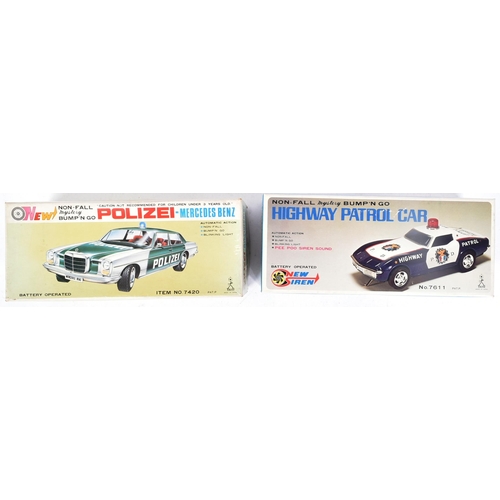 231 - Tinplate Toys - x2 vintage Japanese (Taiyo) tinplate battery operated police cars. One being a Highw... 