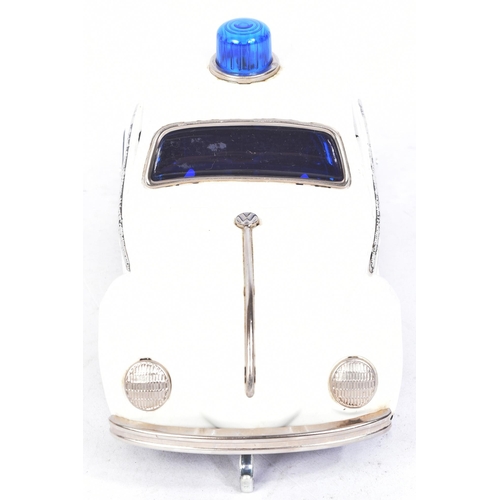 249 - Tinplate Toys - a vintage Japanese (Taiyo) tinplate battery operated VW Volkswagen Police Car with B... 