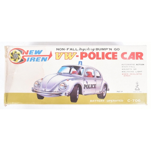 249 - Tinplate Toys - a vintage Japanese (Taiyo) tinplate battery operated VW Volkswagen Police Car with B... 