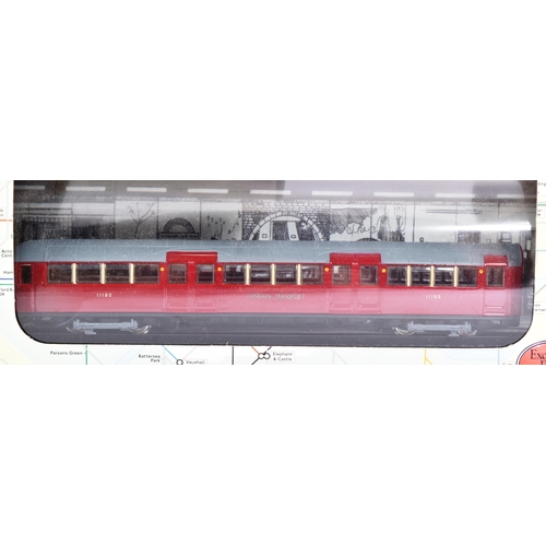 25 - Three model diecast Gilbow London Tube Stock Carriages, 1/76 scale. Comprising of; 1959 Driving Carr... 