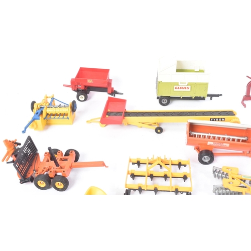 261 - Diecast - a collection of vintage Britains diecast model farm equipment and lead toy animals. Variou... 