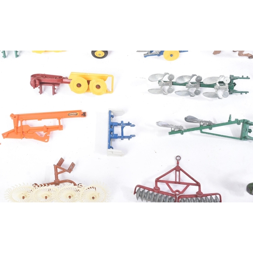 261 - Diecast - a collection of vintage Britains diecast model farm equipment and lead toy animals. Variou... 