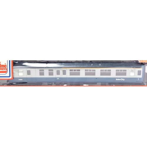 297 - A collection of x7 Lima OO gauge model railway rolling stock coaches and wagons comprising; No. 3053... 