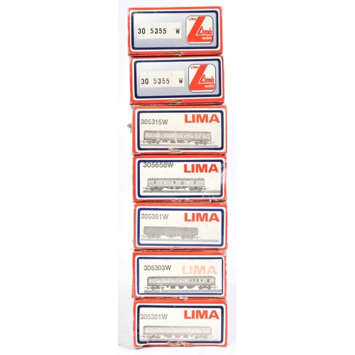 297 - A collection of x7 Lima OO gauge model railway rolling stock coaches and wagons comprising; No. 3053... 