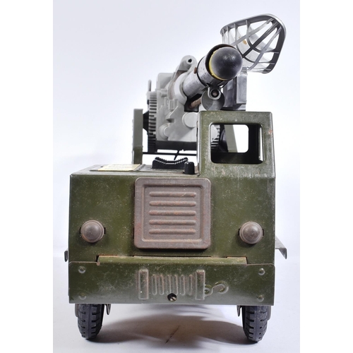 310 - An original vintage Louis Marx made large scale battery operated tinplate toy ' Mobile Long Range At... 