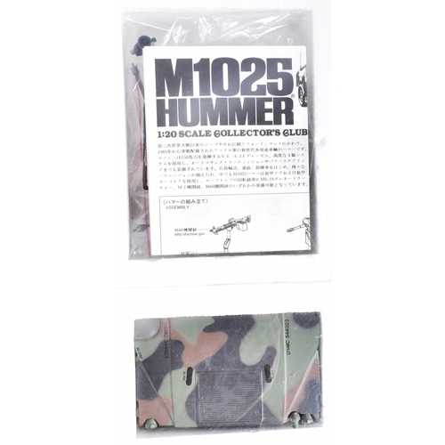 342 - Model Kits - an original Tamiya 1/20 scale plastic model kit of an M1025 Hummer. A semi assembled ex... 