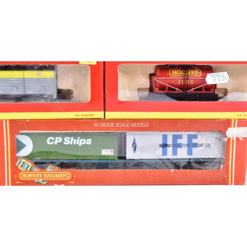 39 - A collection of Hornby OO gauge model railway trainset locomotive rolling stock to include; No. R621... 