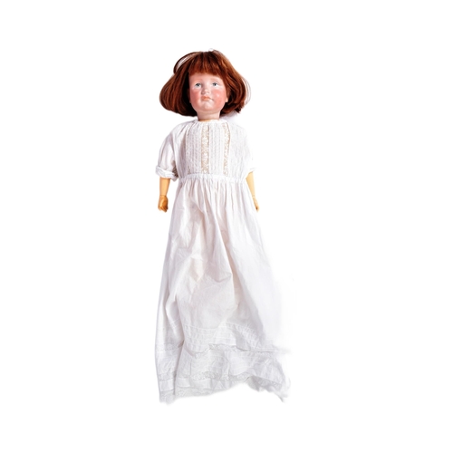 50 - An early 20th Century German ' Kammer & Reinhardt ' bisque headed doll with a replacement compositio... 