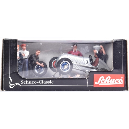 58 - Schuco - x2 Schuco made tinplate clockwork models comprising; 1050 Mercedes Grand Prix 1936 (with ke... 