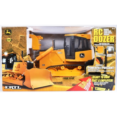 9 - A large scale ERTL made RC Radio Control model of a John Deere Bulldozer. The model with moving blad... 