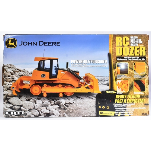 9 - A large scale ERTL made RC Radio Control model of a John Deere Bulldozer. The model with moving blad... 