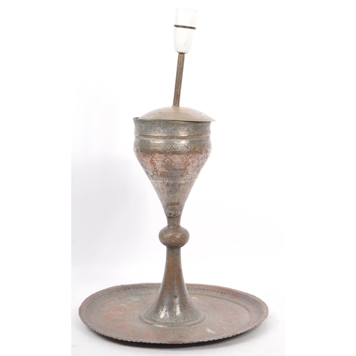 809 - Two 19th century hammered copper and brass Indian converted desk lamps. One having a embossed floral... 