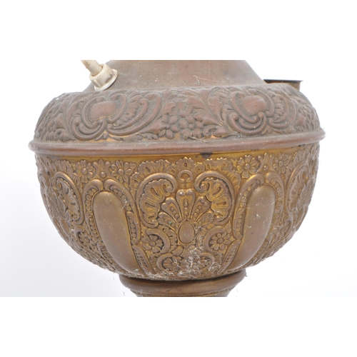 809 - Two 19th century hammered copper and brass Indian converted desk lamps. One having a embossed floral... 