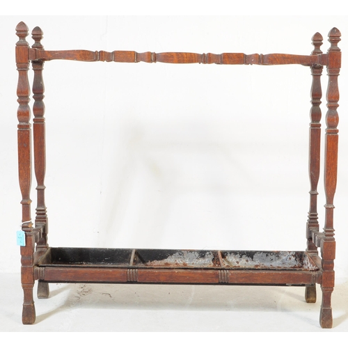 814 - A Victorian 19th century mahogany hall way umbrella / walking stick stand. Of rectangular shape with... 