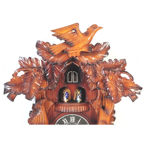 A large contemporary German Black Forest style Kaiser Quartz cuckoo