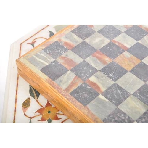 110 - A 20th century Indian inlaid pietra dura marble occasional chess games  table. The table having the ... 