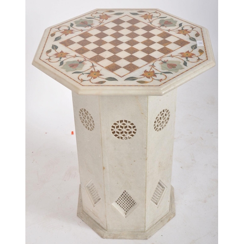 110 - A 20th century Indian inlaid pietra dura marble occasional chess games  table. The table having the ... 