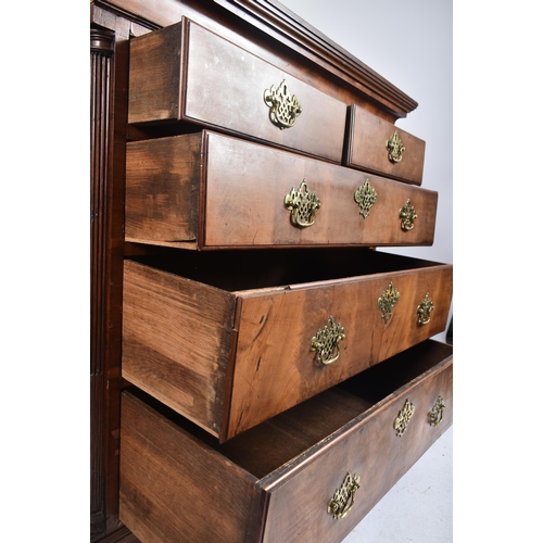 114 - A 19th century mahogany two over three chest of drawers. The chest having a straight pediment top ov... 