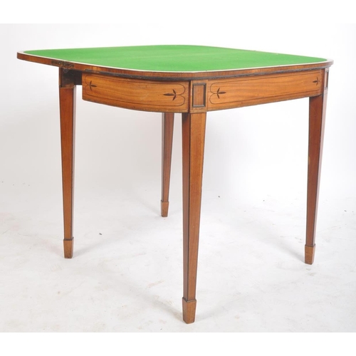 133 - A 19th century George III mahogany and satinwood fold over card / games table. The table having two ... 