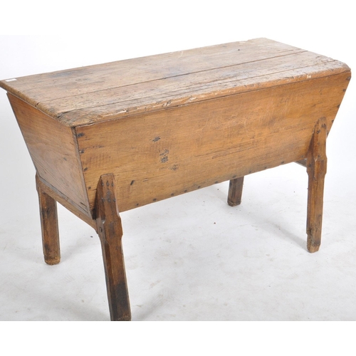 136 - A 19th century country French scrumbled pine dough bin on stand. The angled body complete with a hin... 