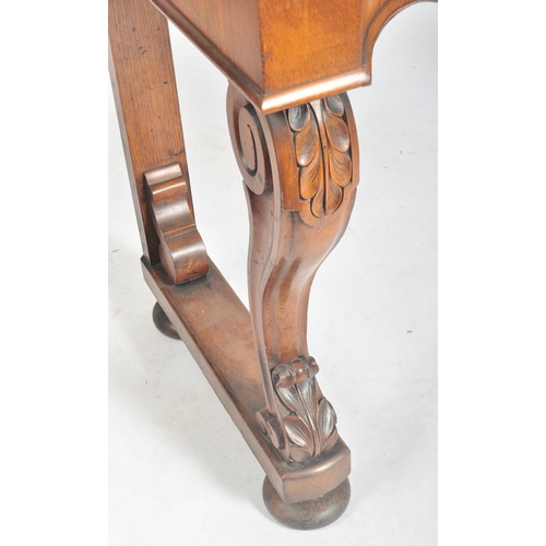 157 - A Victorian 19th century carved oak inverted serpentine front console hall table. The table having a... 