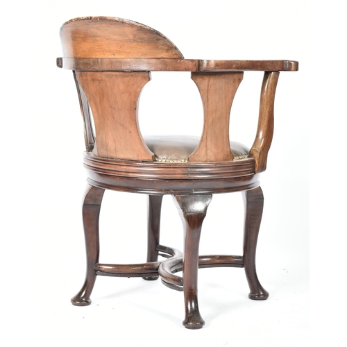 160 - A Victorian 19th century mahogany desk office swivel revolving chair. The chair having a shaped back... 