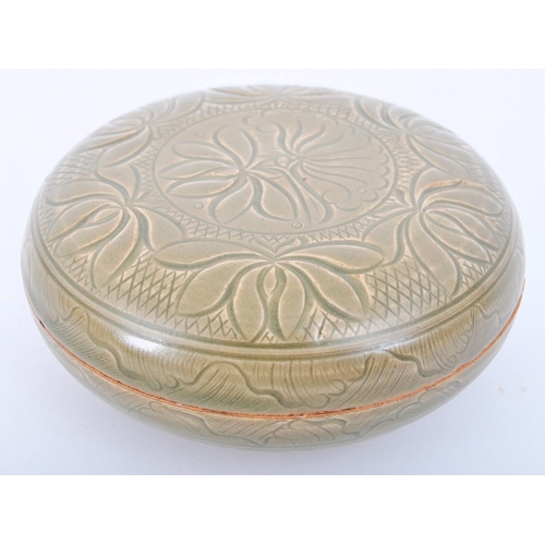 168 - A 19th century Chinese Yaozhou ware ceramic green celadon seal lidded box. The box having floral Yao... 