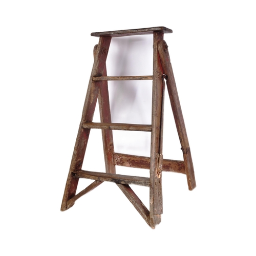 175 - An early to mid 20th century three-rung stepladder. Traditional form, with steel locking hooked supp... 