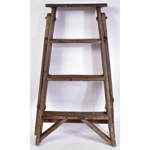 175 - An early to mid 20th century three-rung stepladder. Traditional form, with steel locking hooked supp... 