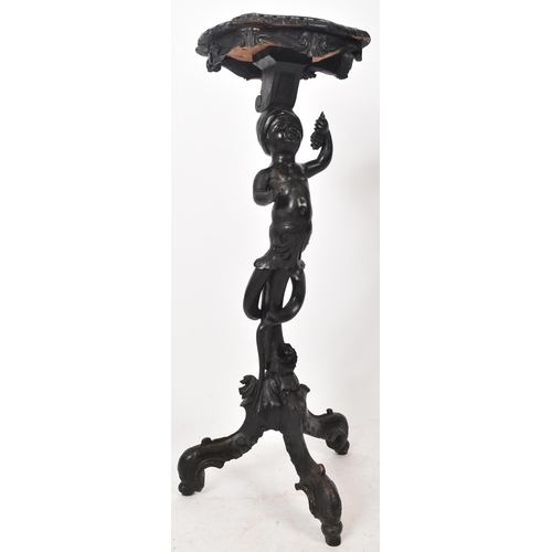 18 - A 19th century Italian ebonised pine torchere bust / plant stand. Shaped top with carved detailing t... 