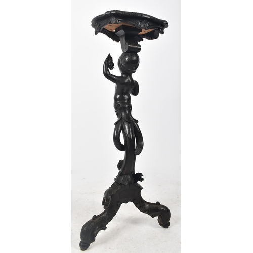 18 - A 19th century Italian ebonised pine torchere bust / plant stand. Shaped top with carved detailing t... 