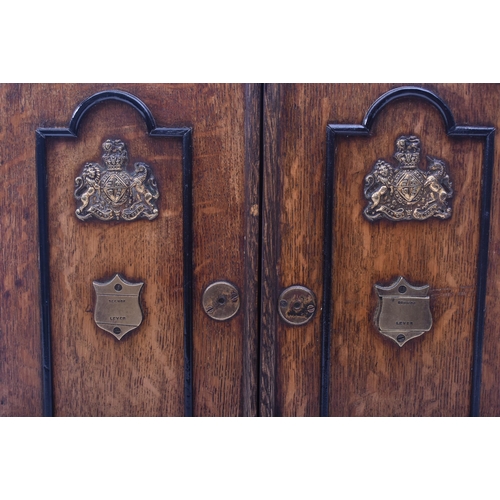 181 - A late Victorian 19th century oak humidor / table smoking cabinet. The humidor having twin panelled ... 