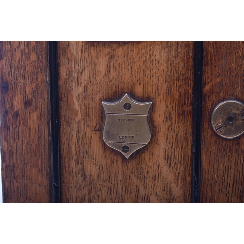 181 - A late Victorian 19th century oak humidor / table smoking cabinet. The humidor having twin panelled ... 