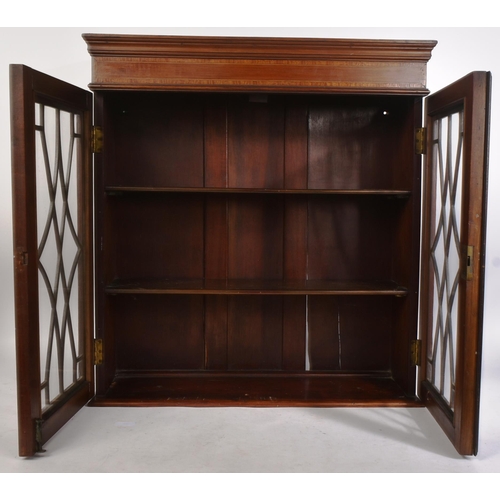 189 - An Edwardian mahogany and boxwood inlaid astragal glazed wall hanging display cabinet. Twin astragal... 